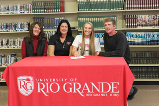 Pleasant High's Kayla Briley is joined by her parents and Rio head coach Billina Donaldson as she signs with the RedStorm